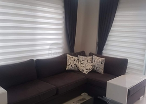 ضمن مجمع عائلي يضم كافة الخدمات -شقة 2 غرفة وصالة -في افسلار /الانيا 