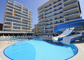 مجمع بخدمات 5 نجوم -شقة 2 غرفة وصالة - في توسمور / الانيا 