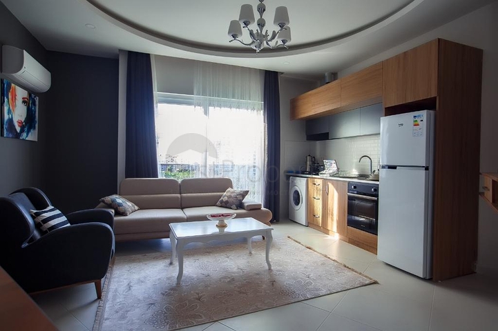 شقة غرفة وصالة -ضمن مجمع سكني جديد - في مهموتلار / الانيا 