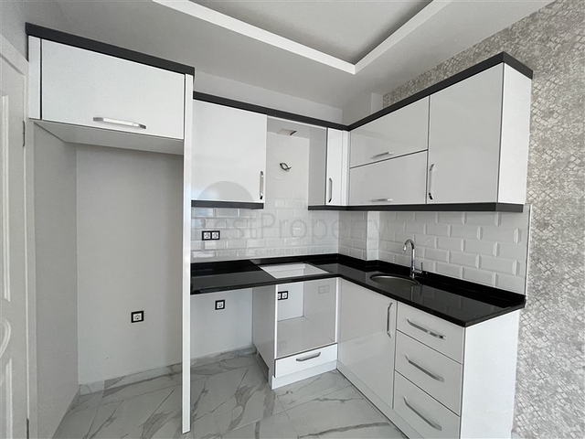 شقق للبيع في الانيا -ضمن مجمع سكني حديث في مهموتلار / الانيا 