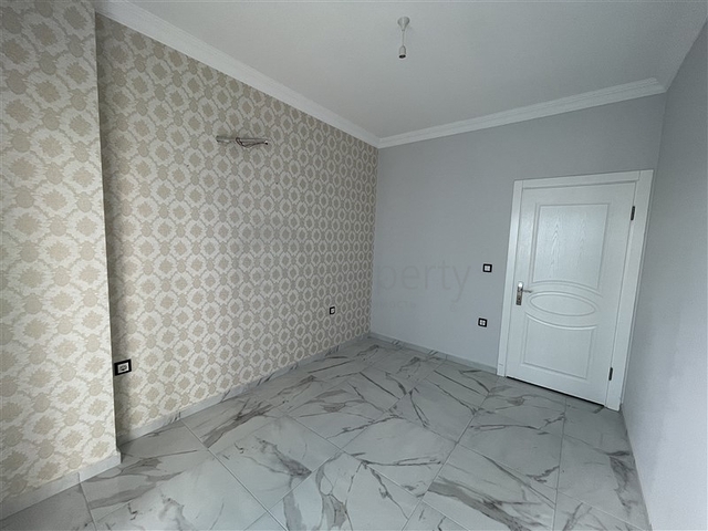 شقق للبيع في الانيا -ضمن مجمع سكني حديث في مهموتلار / الانيا 