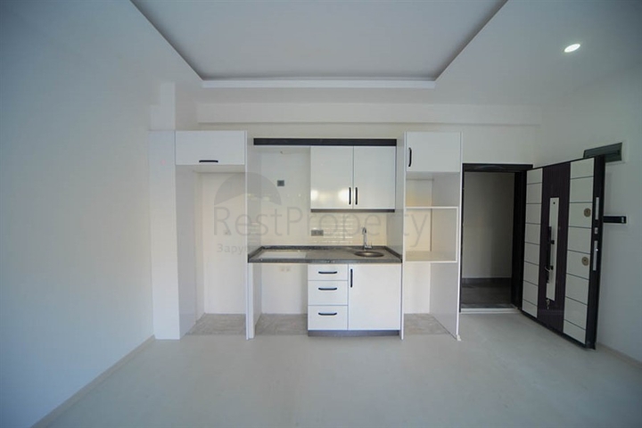 شقة غرفة وصالة - ضمن مجمع سكني حديث قريب من البحر - في مهموتلار / الانيا 