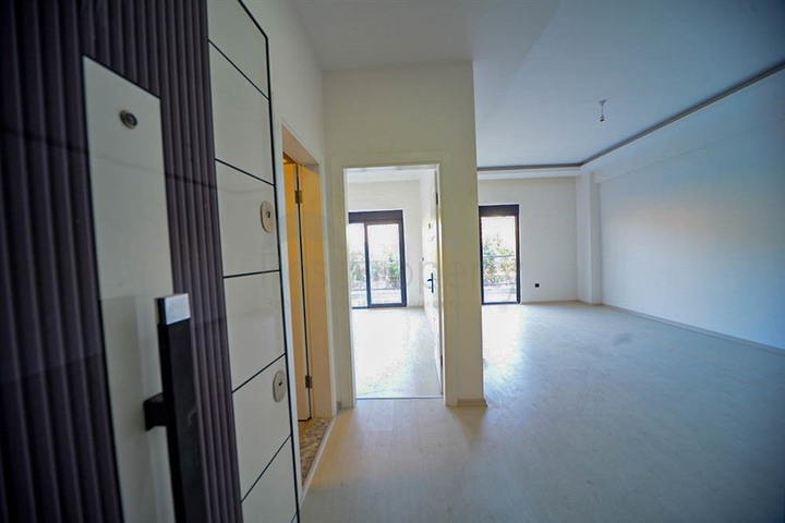 شقة غرفة وصالة - ضمن مجمع سكني حديث قريب من البحر - في مهموتلار / الانيا 