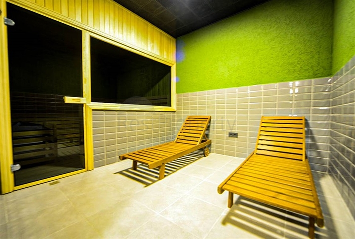 شقة غرفة وصالة - ضمن مجمع سكني حديث قريب من البحر - في مهموتلار / الانيا 