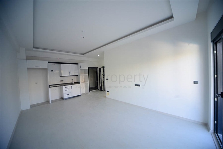 شقة غرفة وصالة - ضمن مجمع سكني حديث قريب من البحر - في مهموتلار / الانيا 