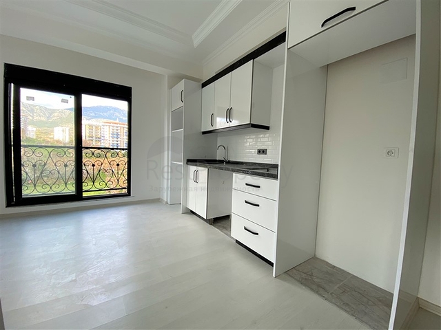 شقق غرفة وصالة ضمن مجمع جديد -في مهموتلار / الانيا 