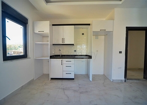 مجمع جديد - شقة غرفة وصالة - في مهموتلار / الانيا 