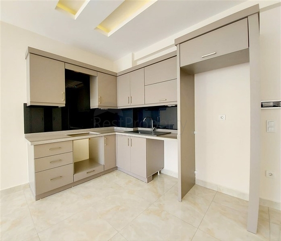 مجمع جديد -شقة  غرفة وصالة - في مهموتلار / الانيا 