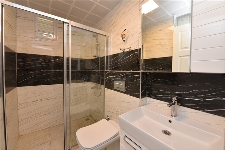 شقة غرفة وصالة - ضمن مجمع سكني في مهموتلار / الانيا 