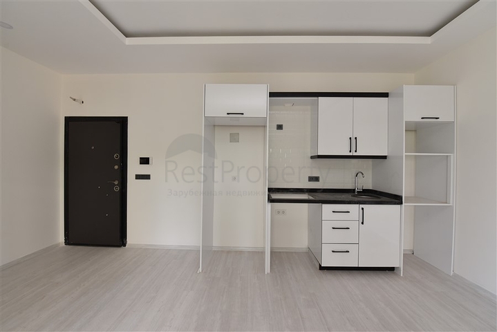 شقة غرفة وصالة - ضمن مجمع سكني في مهموتلار / الانيا 