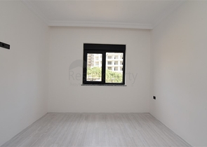 شقة غرفة وصالة - ضمن مجمع سكني في مهموتلار / الانيا 