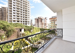 شقة غرفة وصالة - ضمن مجمع سكني في مهموتلار / الانيا 