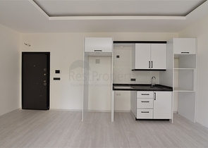 شقة غرفة وصالة - ضمن مجمع سكني في مهموتلار / الانيا 