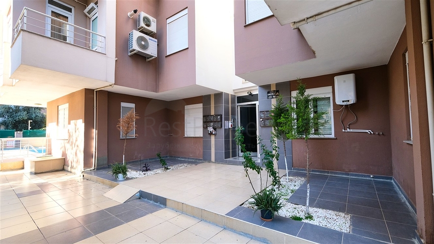 شقة 2 + 1 تطل على الحديقة بمساحة  750 م من البحر في انطاليا