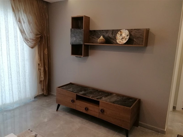 شقة مؤثثة  -من تصميم 1+1 - في مهموتلار / الانيا 