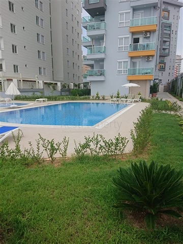 شقة مؤثثة  -من تصميم 1+1 - في مهموتلار / الانيا 