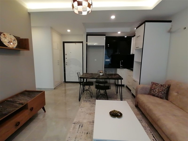 شقة مؤثثة  -من تصميم 1+1 - في مهموتلار / الانيا 