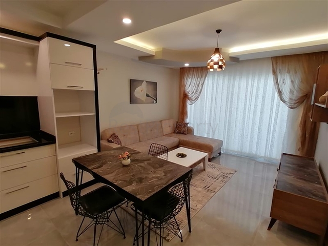 شقة مؤثثة  -من تصميم 1+1 - في مهموتلار / الانيا 