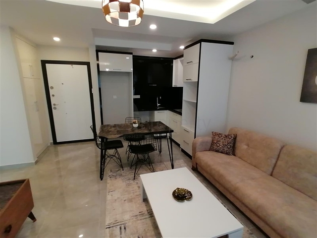 شقة مؤثثة  -من تصميم 1+1 - في مهموتلار / الانيا 