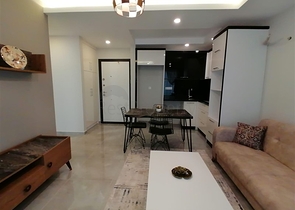 شقة مؤثثة  -من تصميم 1+1 - في مهموتلار / الانيا 