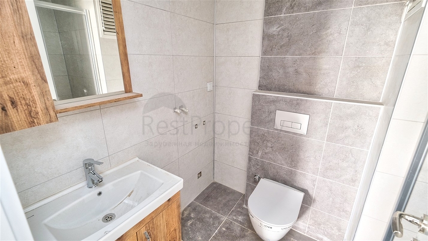 شقة بغرفتي نوم في مجمع جديد في كونيالتي أنطاليا