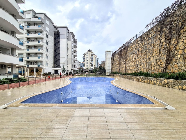 شقة 2 غرفة وصالة -مفروشة -ضمن مجمع يضم خدمات -في افسلار / الانيا