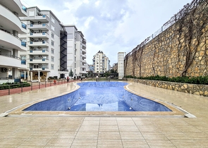 شقة 2 غرفة وصالة -مفروشة -ضمن مجمع يضم خدمات -في افسلار / الانيا