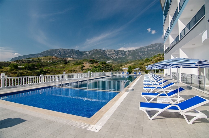 ضمن منطقة جبلية هادئة -مجمع حديث -شقة 1+1- في كارجي جاك / الانيا 