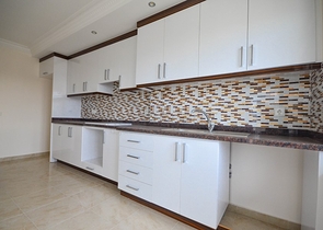 اطلالة بحر - دوبلكس بسعر منافس -من تصميم 1+4 - في مدينة الانيا/ منطقة مهموتلار 