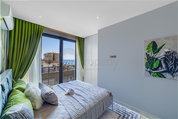 ضمن مجمع على البحر مباشرة -شقة دوبلكس انيقة -تصميم 1+1- في مهموتلار / الانيا 