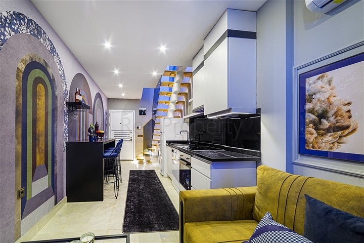 ضمن مجمع على البحر مباشرة -شقة دوبلكس انيقة -تصميم 1+1- في مهموتلار / الانيا 