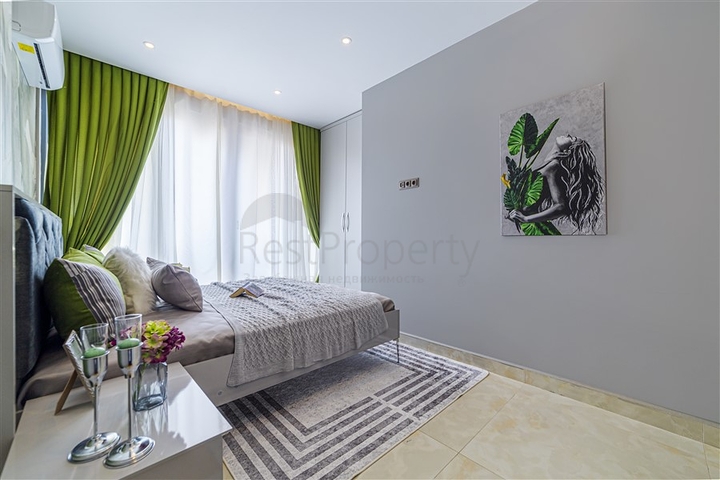 ضمن مجمع على البحر مباشرة -شقة دوبلكس انيقة -تصميم 1+1- في مهموتلار / الانيا 