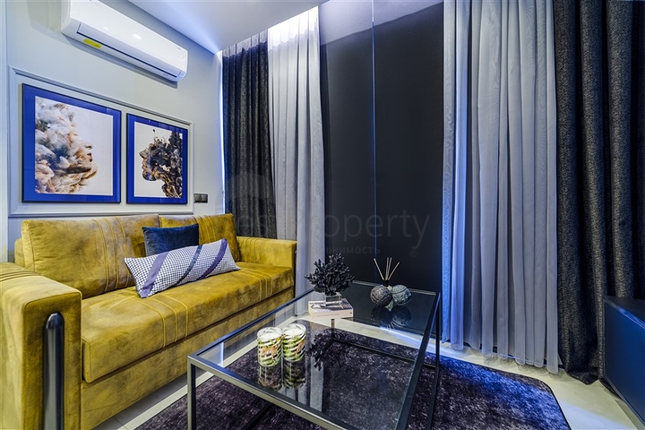 ضمن مجمع على البحر مباشرة -شقة دوبلكس انيقة -تصميم 1+1- في مهموتلار / الانيا 