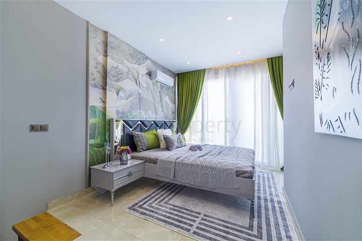 ضمن مجمع على البحر مباشرة -شقة دوبلكس انيقة -تصميم 1+1- في مهموتلار / الانيا 