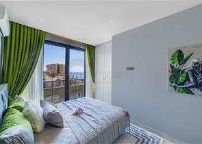 ضمن مجمع على البحر مباشرة -شقة دوبلكس انيقة -تصميم 1+1- في مهموتلار / الانيا 