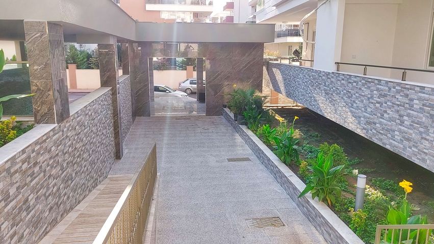 شقة بغرفة نوم واحدة في مبنى جديد في كونيالتي أنطاليا