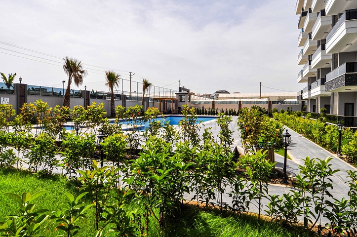 دوبلكس ارضية -ضمن مجمع حديث وانيق - تصميم 1+2- في كارجي جاك / الانيا 