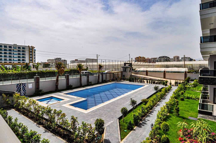 دوبلكس ارضية -ضمن مجمع حديث وانيق - تصميم 1+2- في كارجي جاك / الانيا 