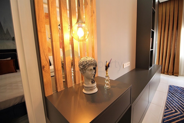 شقة انيقة -اثاث جديد - تصميم 2 غرفة وصالة -في مهموتلار / الانيا 