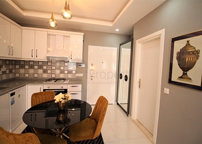 شقة انيقة -اثاث جديد - تصميم 2 غرفة وصالة -في مهموتلار / الانيا 