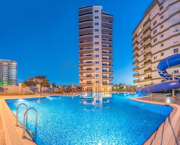 واسعة نسبيا - شقة 1+1 - مفروشة -ضمن مجمع انيق -في مهموتلار / الانيا