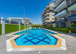 شقة انيقة ضمن مجمع حديث فاخر - تصميم 1+1 مع الاثاث -في كارجي جاك / الانيا 