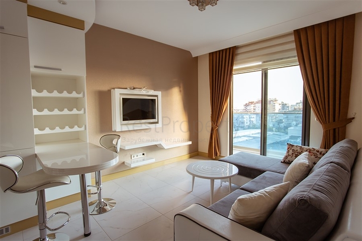 مناسبة للاستثمار - شقة في مركز الانيا - تصميم 1+1 