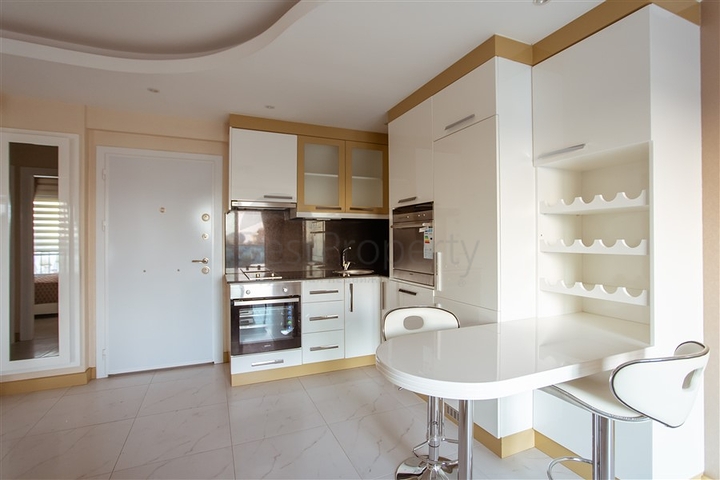 مناسبة للاستثمار - شقة في مركز الانيا - تصميم 1+1 