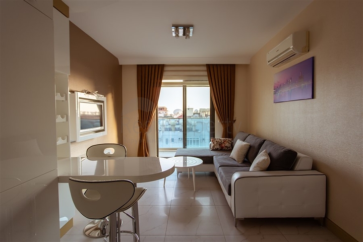 مناسبة للاستثمار - شقة في مركز الانيا - تصميم 1+1 