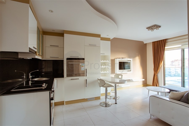 مناسبة للاستثمار - شقة في مركز الانيا - تصميم 1+1 