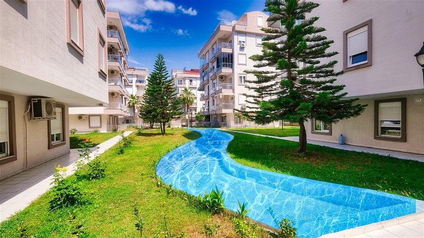 شقة 2 + 1 على مسافة قريبة من البحر في أنطاليا