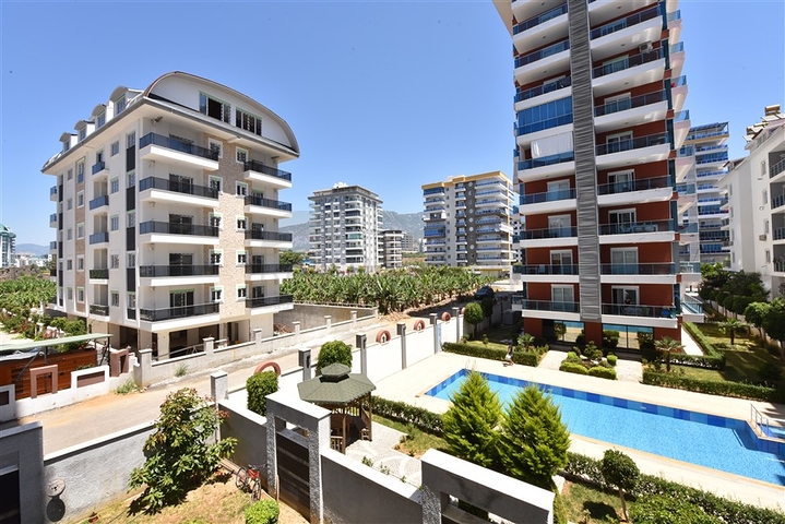 سعر منافس - شقة 2 غرفة وصالة -ضمن مجمع قريب من البحر -في مهموتلار / الانيا 