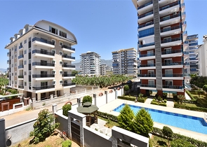 سعر منافس - شقة 2 غرفة وصالة -ضمن مجمع قريب من البحر -في مهموتلار / الانيا 