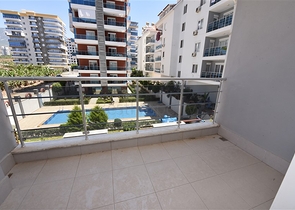 سعر منافس - شقة 2 غرفة وصالة -ضمن مجمع قريب من البحر -في مهموتلار / الانيا 